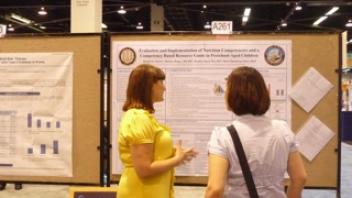 CNS researcher Rachel Scherr with her poster at Experimental Biology.