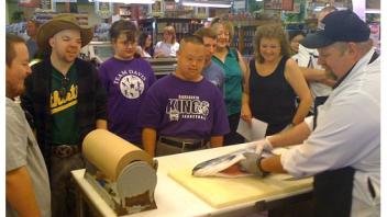 During a field trip to a local grocery store where the butcher showed participants how a salmon goes from a whole fish to what is seen in