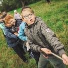 children playing tug of war