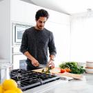 man cooking in kitchen